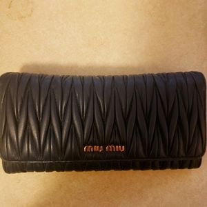 Auth miu miu large matelasse nappa leather wallet